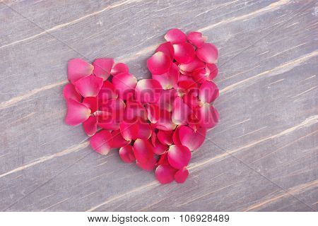 Heart Fromm Flowers On The Wooden Background