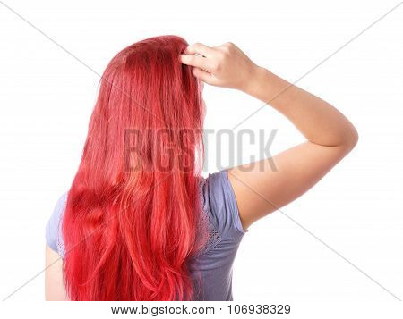 woman scratching her head