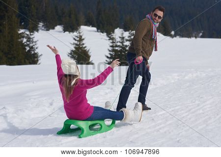 romantic winter  scene, happy young couple having fun on fresh show on winter vacatio, mountain nature landscape