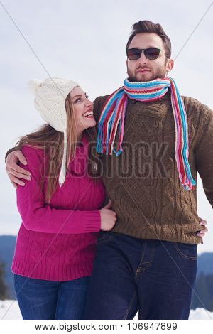 portrait of happy young romantic tourist  couple outdoor in nature at winter vacation