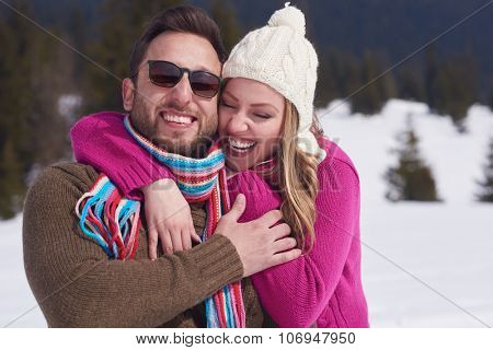 portrait of happy young romantic tourist  couple outdoor in nature at winter vacation