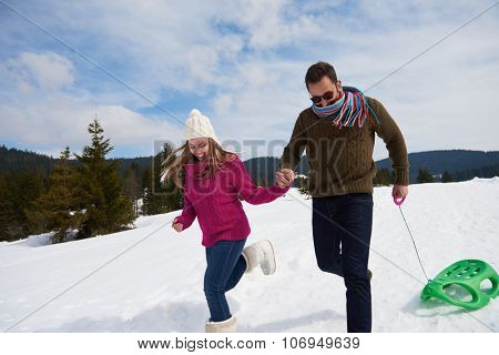 romantic winter  scene, happy young couple having fun on fresh show on winter vacatio, mountain nature landscape