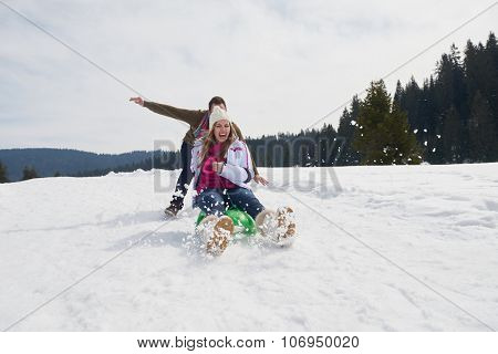 romantic winter  scene, happy young couple having fun on fresh show on winter vacatio, mountain nature landscape