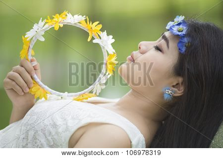 Girl with yellow flower hairband