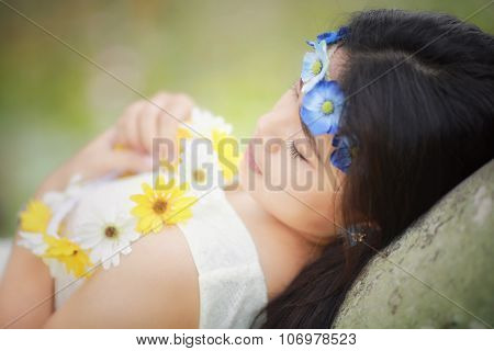 Girl with yellow flower hairband