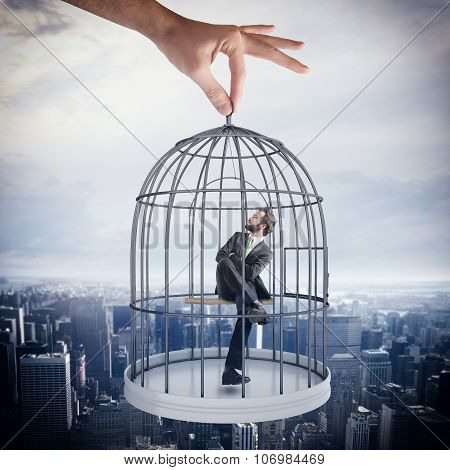 Caged  businessman