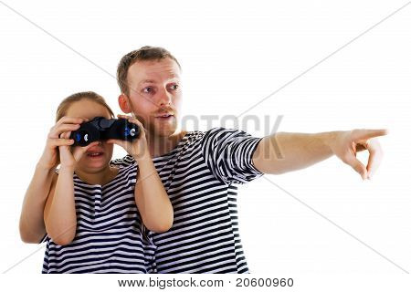Vader en dochter met verrekijker
