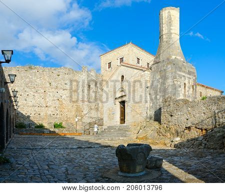 ULCINJ MONTENEGRO - SEPTEMBER 9 2017: Unknown woman visits Archaeological Museum in Old Town Ulcinj Montenegro