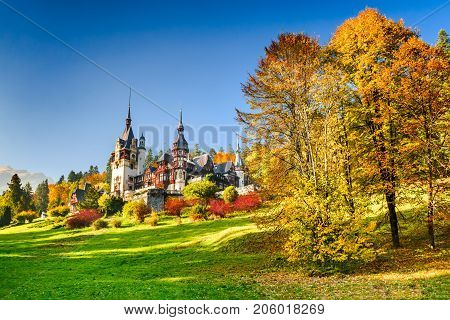 Peles Castle Romania. Famous Neo-Renaissance castle and ornamental garden in Sinaia Carpathian Mountains in Europe.