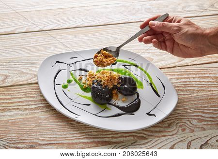 Molecular gastonomy cuttlefish roes with citrus mayonnaise