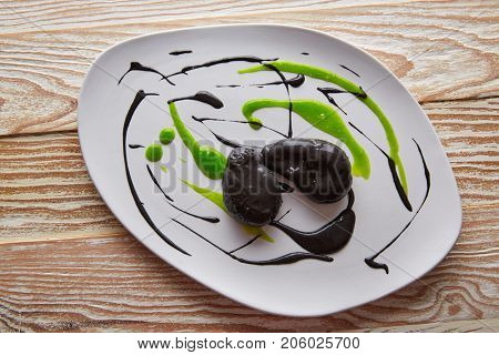 Molecular gastonomy cuttlefish roes with citrus mayonnaise