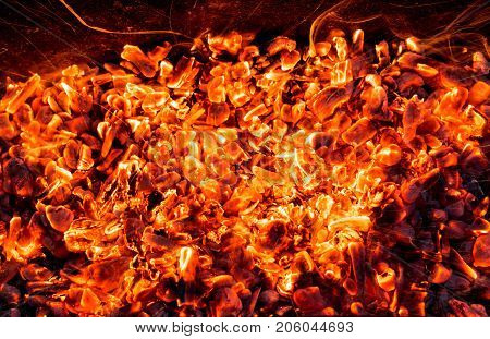 abstract background of burning coals . Photo of an abstract texture