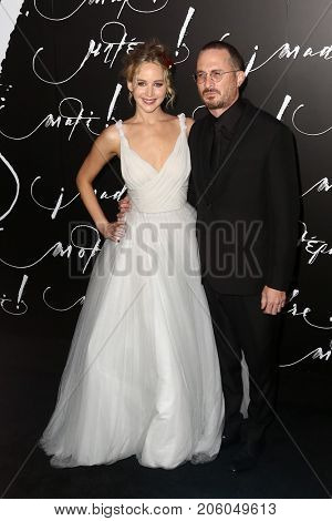 NEW YORK-SEP 13: Actress Jennifer Lawrence (L) and director Darren Aronofsky attend the 
