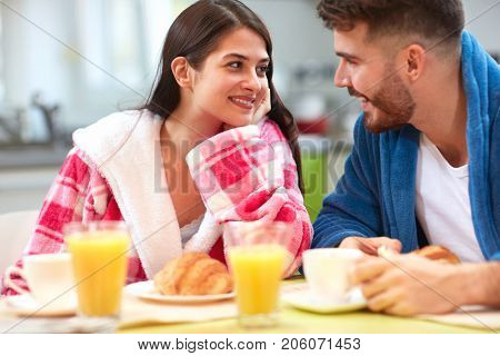 Couple have breakfast in the morning together