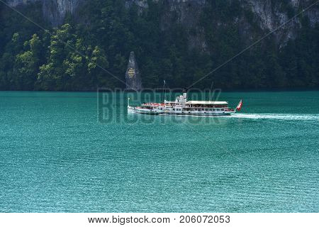 Schiller Stone  And Swiss Retro Wheel Steamer On Lake Lucerne, Switzerland