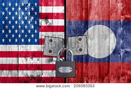 US and Laos flag on door with padlock