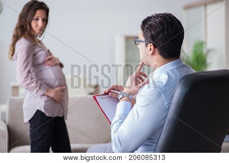 Pregnant woman visiting psychologist doctor