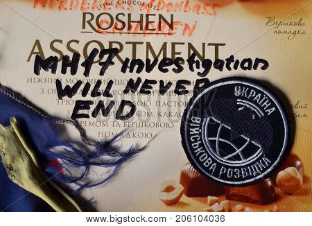 ILLUSTRATIVE EDITORIAL. Chevron of Ukrainian Army. With logo Roshen Inc. Trademark Roshen is property of Ukrainian president Poroshenko. MH17 flight investigation. Kiev,Ukraine.September 10, 2017