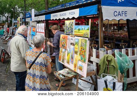 PARIS,FRANCE - JULY 31,2017 : Painters at the Place du Tertre in the historic district of Montmartre