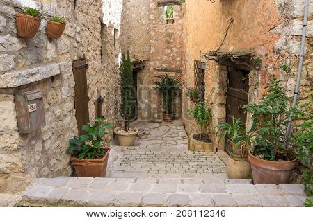 TOURRETTES-SUR-LOUP, FRANCE - APRIL 25, 2016: Street of Tourrettes-sur-Loup a medieval village in the Alpes-Maritimes department in southeastern France