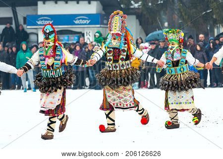 Razlog, Bulgaria - January 14, 2017: People in traditional carnival kuker costumes at Kukeri festival Starchevata