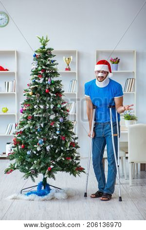 Injured man celebrating christmas at home