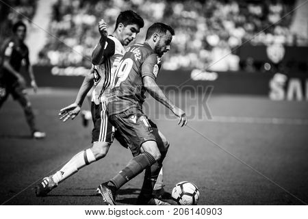 VALENCIA, SPAIN - SEPTEMBER 16: Pedro Lopez with ball during Spanish La Liga match between Levante Ud and Valencia CF at Ciutat de Valencia Stadium on September 16, 2017 in Valencia, Spain