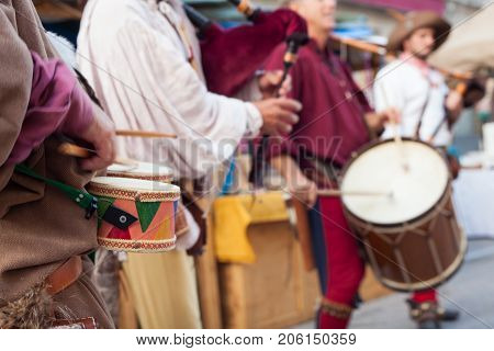 PALMANOVA ITALY - SEPTEMBER 03: Historical bagpiper and drummer dressed in ancient clothes during the historical Reenactment a.d. 1615 on September 03 2017
