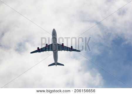 SEWAREN NEW JERSEY - April 5 2017: A large airliner flies over Sewaren in early spring.