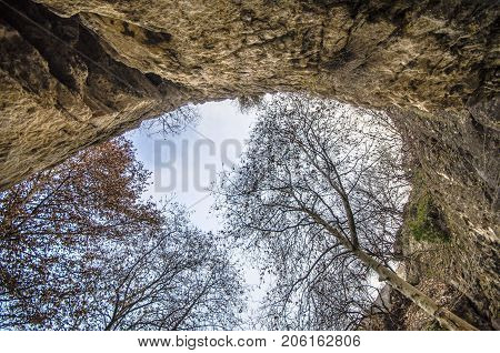 Rocky Cave With Trees Overlooking To The Sky. Gazakh Damcili Azerbaijan