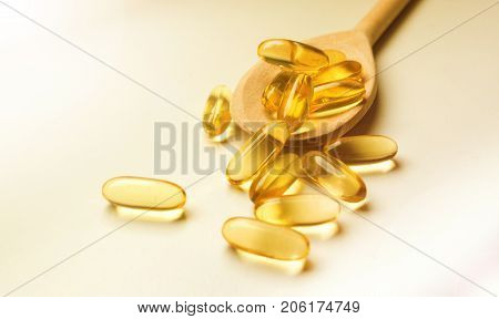 Fish liver oil omega 3 gel capsules isolated on White sunny background