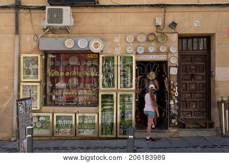 TOLEDO,SPAIN - AUGUST 8,2017 : Typical handicraft shop in the medieval city of Toledo in Spain