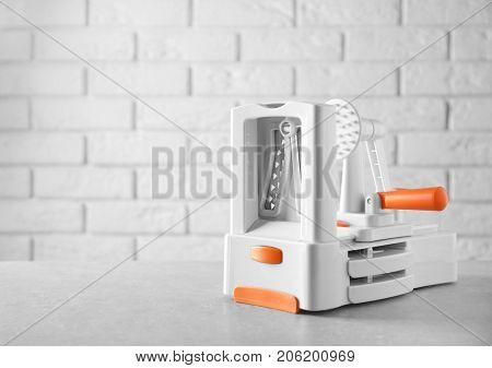 Spiral vegetable slicer on table