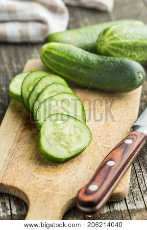 Sliced green cucumbers. Cucumbers on cutting board.