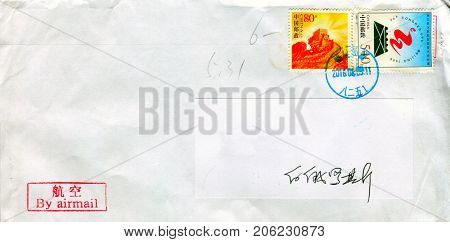 GOMEL, BELARUS - AUGUST 12, 2017: Old envelope which was dispatched from China to Gomel, Belarus, August 12, 2017. 