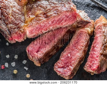 Medium Ribeye steak on the graphite tray.
