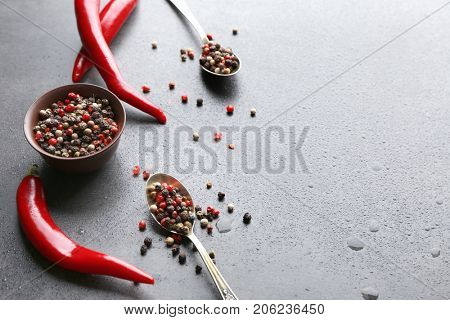 Red chili peppers and peppers mix on table