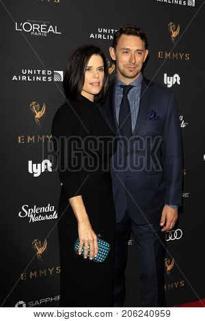 LOS ANGELES - SEP 15:  Neve Campbell, JJ Feild at the Emmy Awards Performers Nominee Reception at the Wallis Annenberg Center for the Performing Arts on September 15, 2017 in Beverly Hills, CA