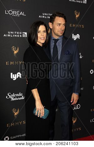 LOS ANGELES - SEP 15:  Neve Campbell, JJ Feild at the Emmy Awards Performers Nominee Reception at the Wallis Annenberg Center for the Performing Arts on September 15, 2017 in Beverly Hills, CA