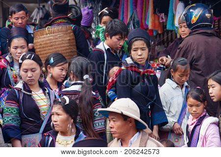 Sa Pa,  Vietnam - January 03, 2010: Black Hmong  ethnic minority peoples in the market , Sa Pa, Lao Cai Province, Northern Vietnam.
