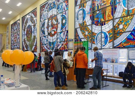 NOVOSIBIRSK, RUSSIA - NOVEMBER 14, 2014: Students of Novosibirsk state university getting information about jobs. The job fair was organized by the NSU Center of graduates