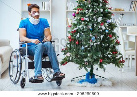 Injured disabled man celebrating christmas at home