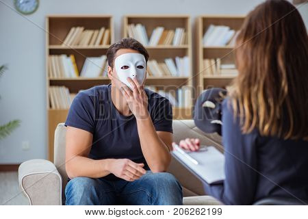Man attending psychology therapy session with doctor