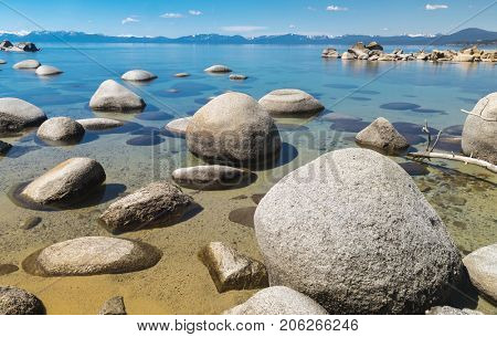 Beautiful boulders and crystal clear water of the lake Tahoe. Hidden Beach, Lake Tahoe - Nevada, USA