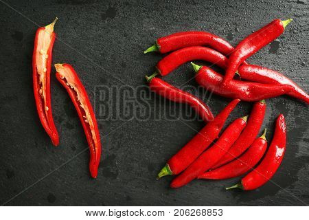 Red chili peppers on gray table