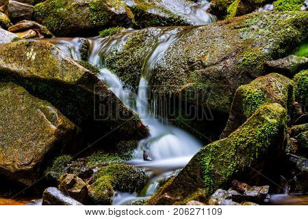 small waterfall on mountain steram