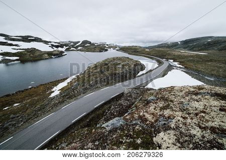 Mountain road Bjorgavegen and Flyvotni Lake. Norwegian Tourist Route Aurlandsfjellet runs from Aurlandsvangen to Laerdalsoyri