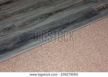 laminate flooring with wood texture on natural cork