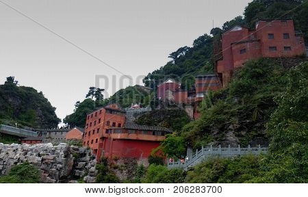 The Wudang MountainsHubei China. Many Taoist monasteries to be found thereIt's world heritate and famous in one of China. It's red temple and red wall. It's a good weather.And It's especially name.
