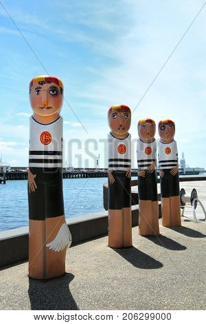 GEELONG, AUSTRALIA - OCTOBER 23, 2016:  Some of the 104 different bollards in Geelong along the baywalk.  All made by Jan Mitchell and represent a chronicle of the city's past.